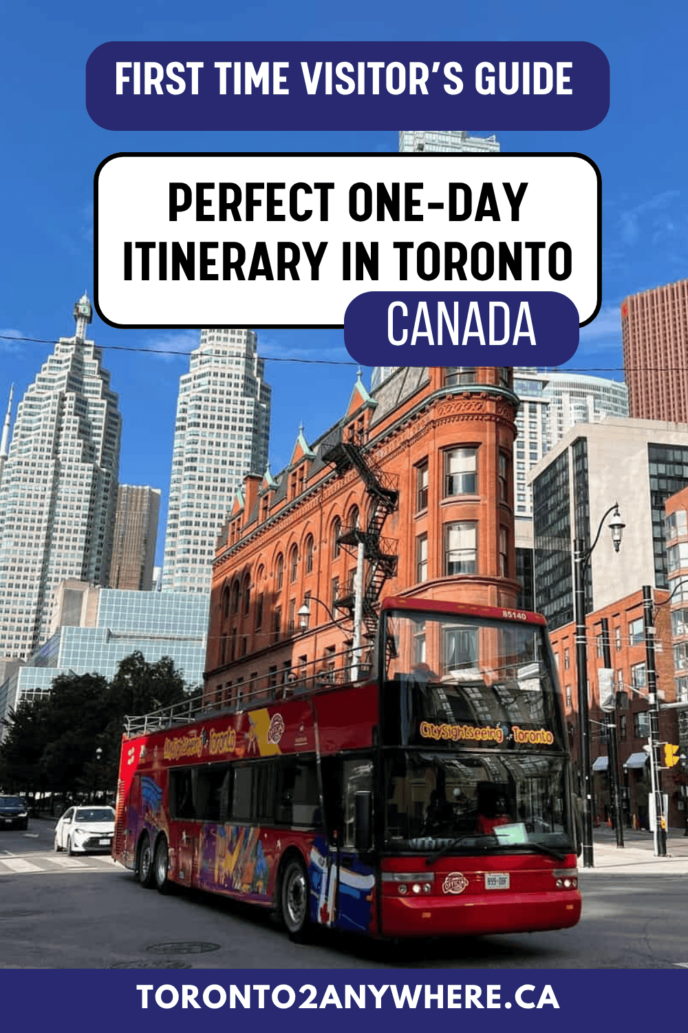 Toronto's Hop-on Hop-off Sightseeing Bus passes by the Gooderham Building in downtown Toronto on a bright summer day. Text overlay reads: First-time visitor's guide. Perfect one-day itinerary in Toronto Canada.