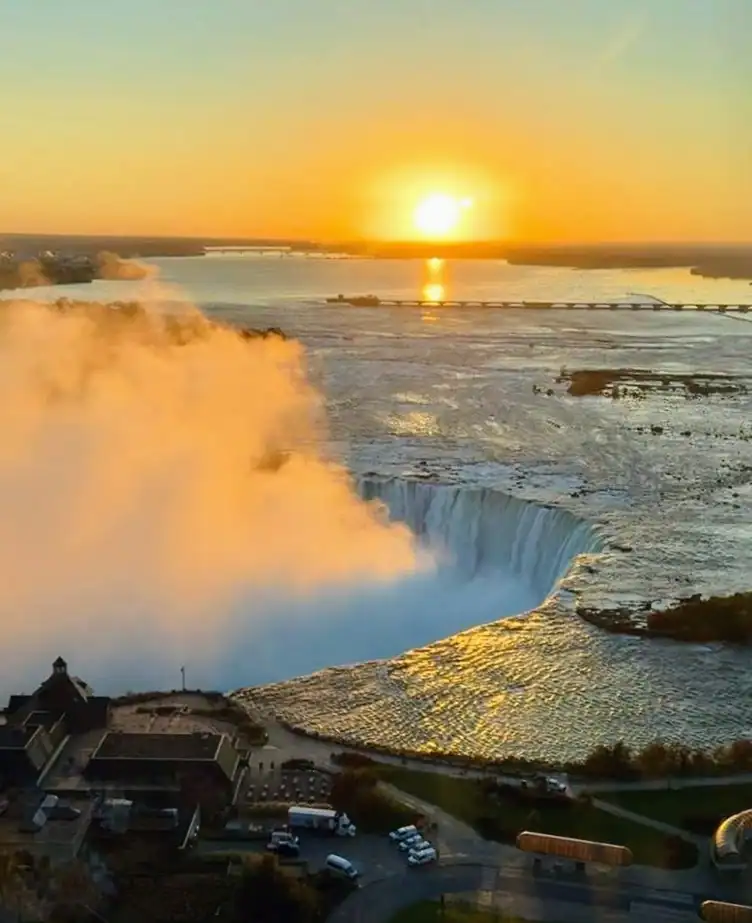 Stunning sunrise over the Canadian Horseshoe Falls taken from a Fallsview Hotel room at the Oakes Hotel.