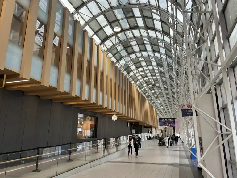 They Skywalk path takes pedestrians between Union Station and the CN tower. This glass covered walkway includes the entrance to the UP Express.